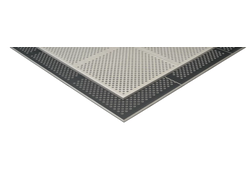 Graue Platte mit schwarzem Lochrand.